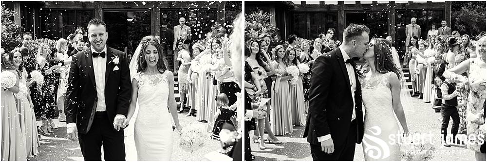 Confetti fun at The Moat House in Acton Trussell by Documentary Wedding Photographer Stuart James