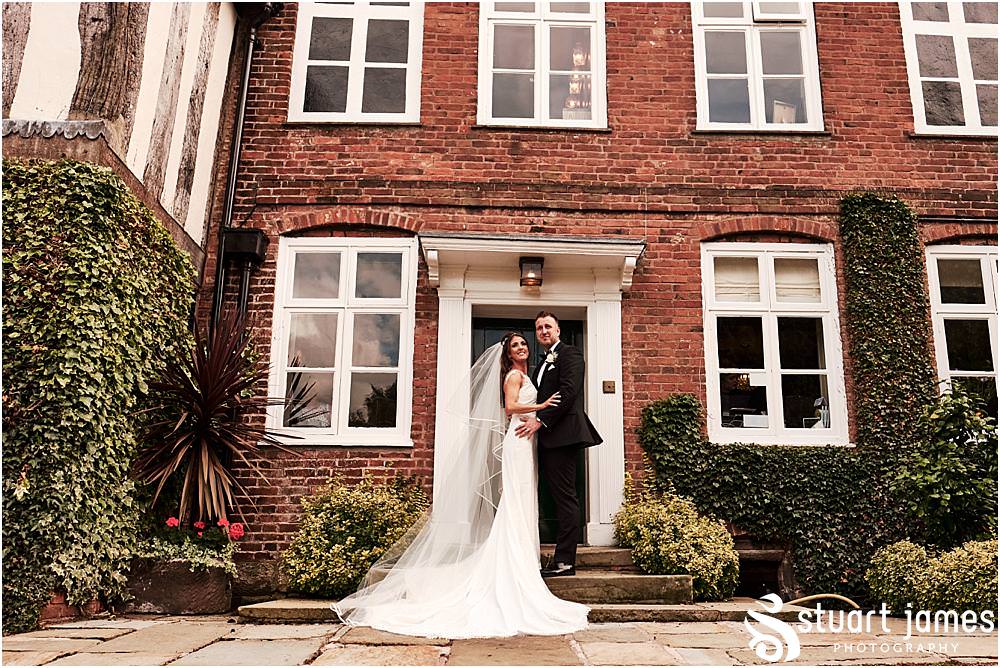 Relaxed, natural and fun portraits with the bride and groom, showing the love between the couple at The Moat House in Acton Trussell by Documentary Wedding Photographer Stuart James