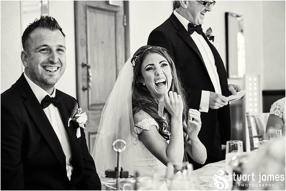 Documentary photographs capturing the wonderful speech and guest reactions at The Moat House in Acton Trussell by Documentary Wedding Photographer Stuart James