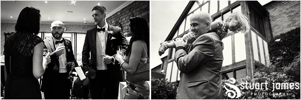 Creative reportage photos of the guests relaxing and enjoying the afternoon reception at The Moat House in Acton Trussell by Documentary Wedding Photographer Stuart James