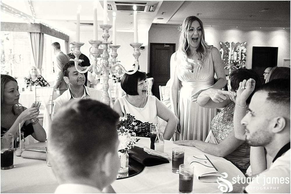 Creative reportage photos of the guests relaxing and enjoying the afternoon reception at The Moat House in Acton Trussell by Documentary Wedding Photographer Stuart James