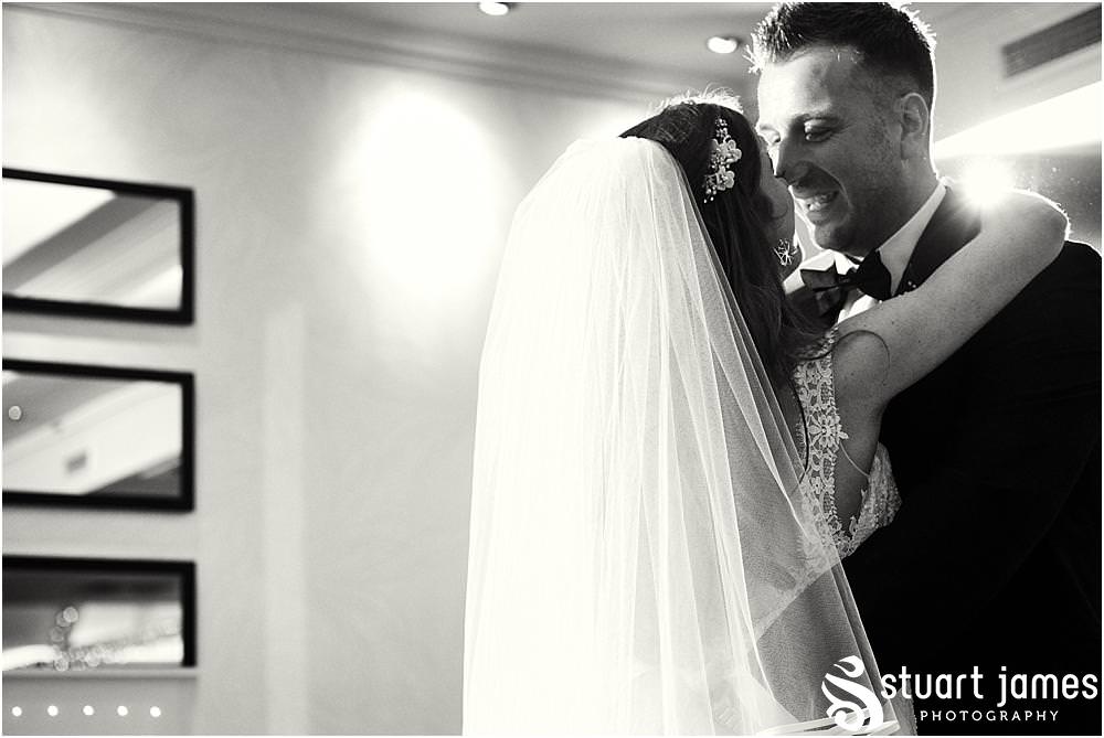 Creative dance floor photographs of the first dance between the bride and groom at The Moat House in Acton Trussell by Documentary Wedding Photographer Stuart James