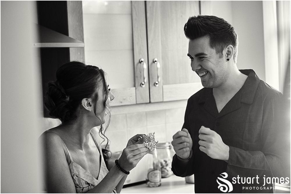 Documenting the story of the wedding preparations with bridal hair and makeup at home in Birmingham by West Midlands Wedding Photographer Stuart James