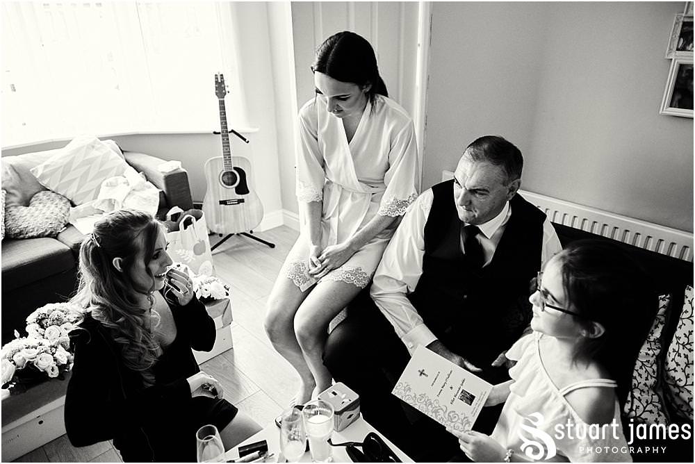Creative relaxed photography capturing the mood and emotion during the excitement of the wedding morning at home in Birmingham by West Midlands Wedding Photographer Stuart James