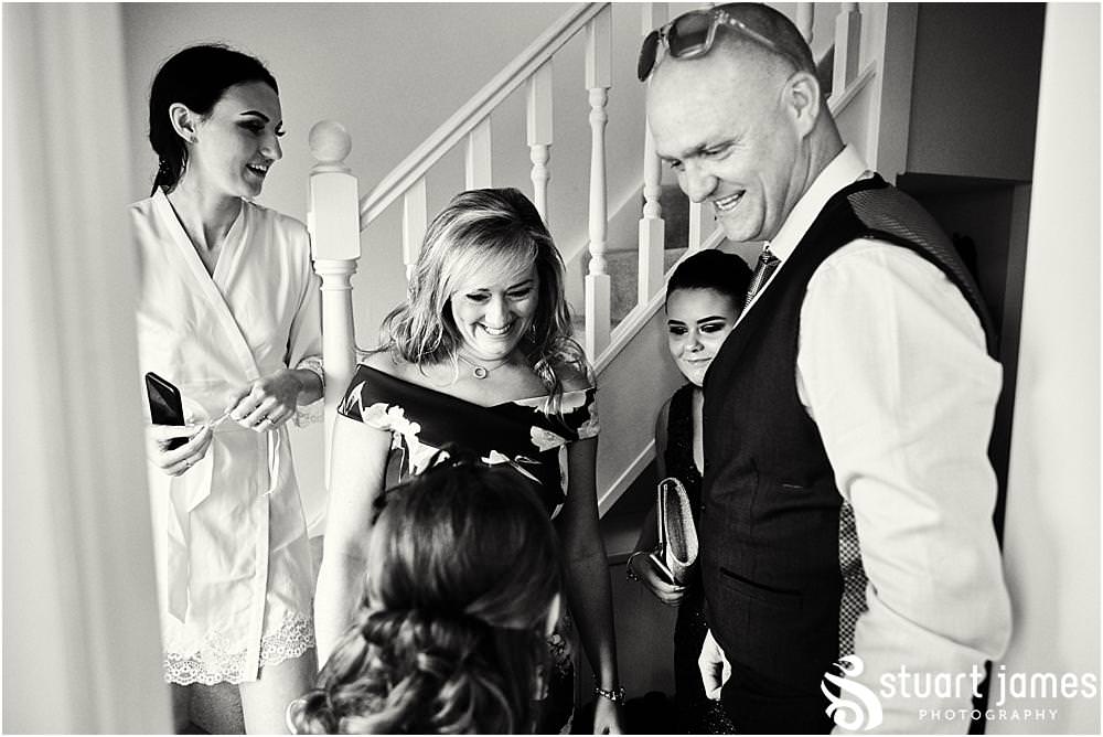 Creative relaxed photography capturing the mood and emotion during the excitement of the wedding morning at home in Birmingham by West Midlands Wedding Photographer Stuart James