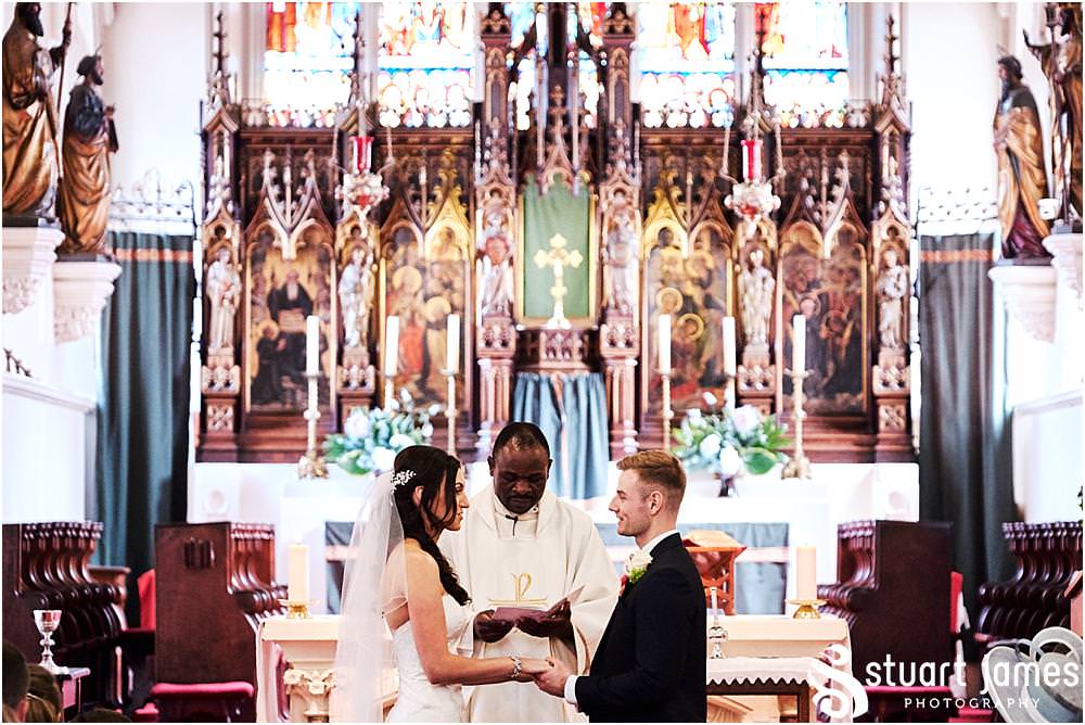 Documenting the emotion and sentiment of the beautiful wedding ceremony at Abbey Church in Erdington by West Midlands Wedding Photographer Stuart James