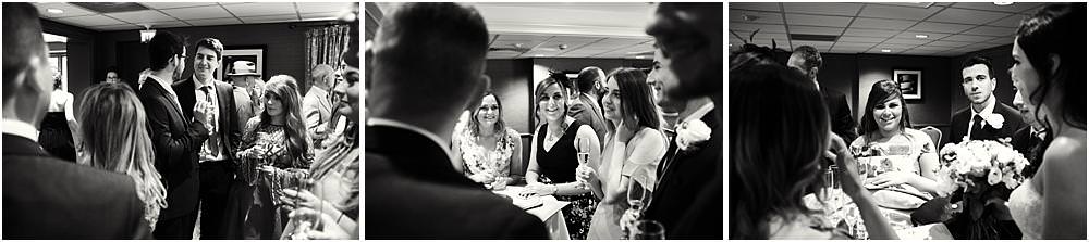 Creative candid photographs of the guests enjoying the drinks reception at The Belfry in Sutton Coldfield by West Midlands Wedding Photographer Stuart James