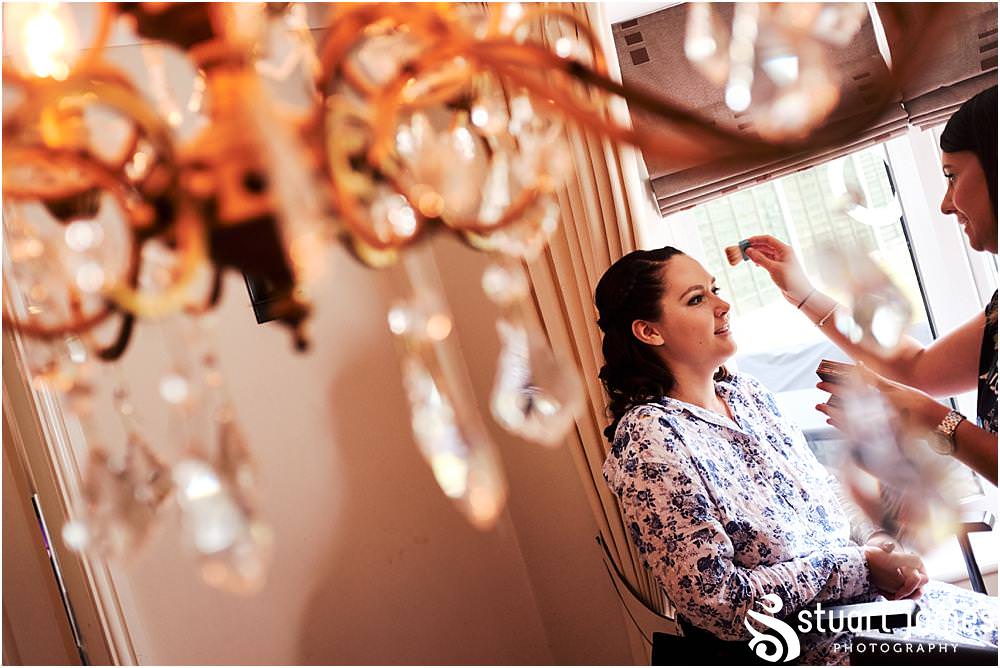Documentary photos of the Bridal preparations with makeup by Kelly Louise at home in Bloxwich by Documentary Wedding Photographer Stuart James