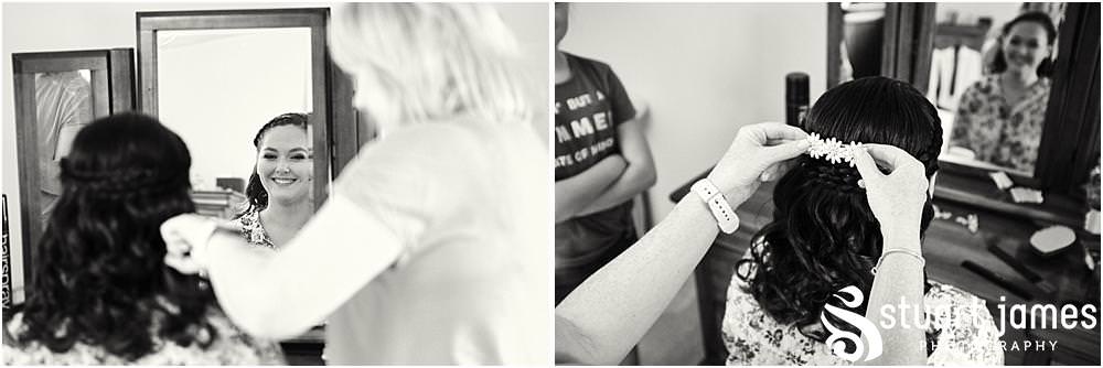 Finishing touches to the bridal hair at home in Bloxwich by Documentary Wedding Photographer Stuart James