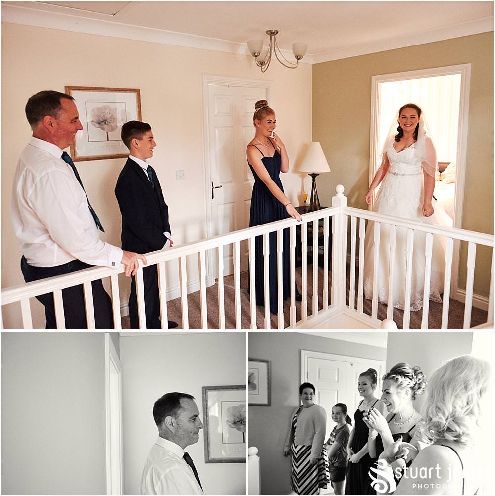 The big reveal as our beautiful bride comes out in her gorgeous gown from Puure bridal in Lymm for the wedding at home in Bloxwich by Documentary Wedding Photographer Stuart James