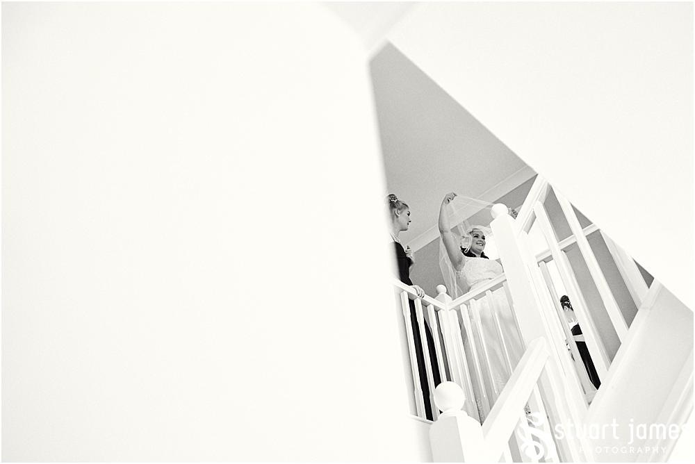 The big reveal as our beautiful bride comes out in her gorgeous gown from Puure bridal in Lymm for the wedding at home in Bloxwich by Documentary Wedding Photographer Stuart James