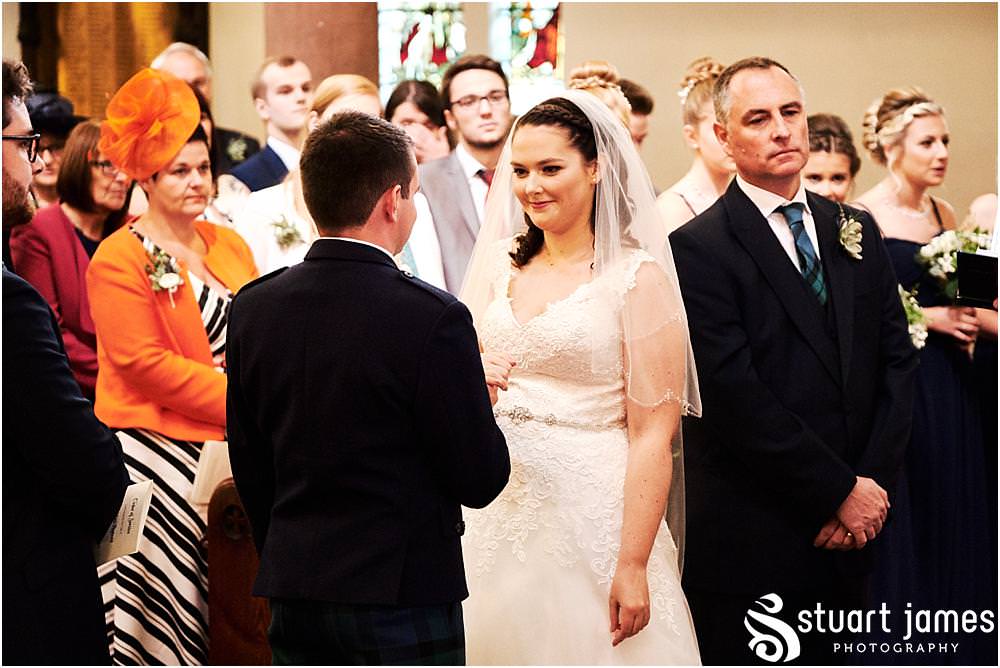 Unobtrusive photographs that tell the story of the wedding ceremony at All Saints Church in Bloxwich by Documentary Wedding Photographer Stuart James