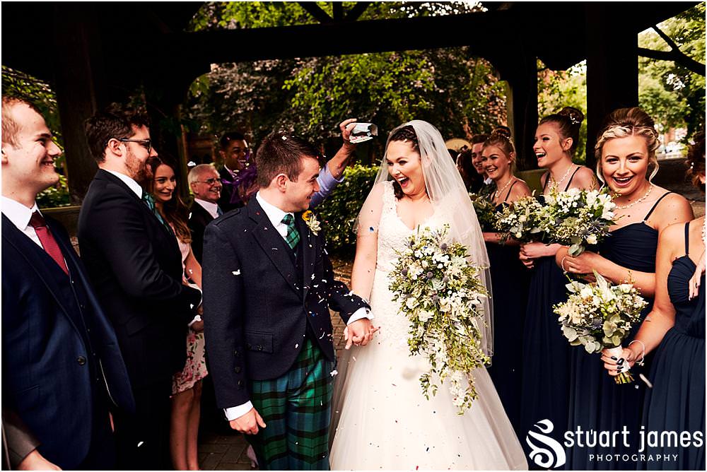 Confetti fun at All Saints Church in Bloxwich by Documentary Wedding Photographer Stuart James