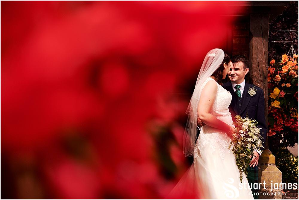 Relaxed and creative portraits of the bride and groom in the stunning grounds at The Moat House in Acton Trussell by Documentary Wedding Photographer Stuart James