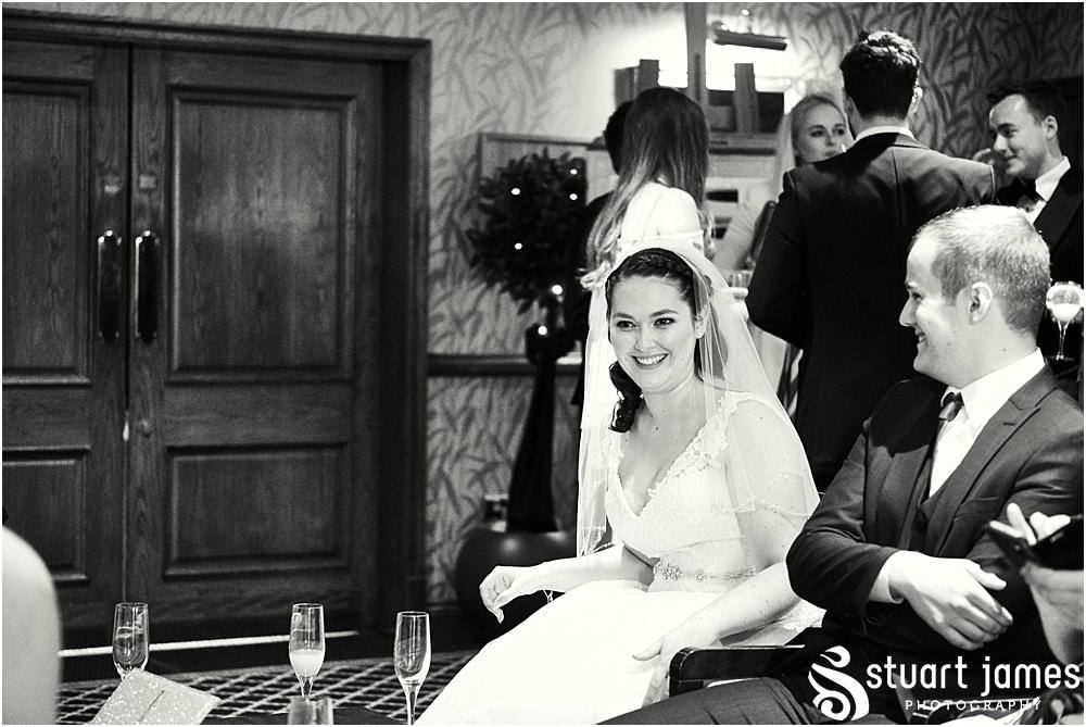 Candid photos of the guests relaxing in the wonderful setting at The Moat House in Acton Trussell by Documentary Wedding Photographer Stuart James