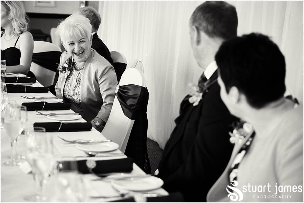 Capturing the guests enjoying the wedding breakfast at The Moat House in Acton Trussell by Documentary Wedding Photographer Stuart James