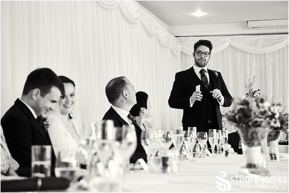 Perfectly toned and delivered speech by the Best Man with wonderful reactions from all of the guests at The Moat House in Acton Trussell by Documentary Wedding Photographer Stuart James