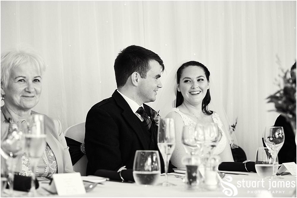 Perfectly toned and delivered speech by the Best Man with wonderful reactions from all of the guests at The Moat House in Acton Trussell by Documentary Wedding Photographer Stuart James