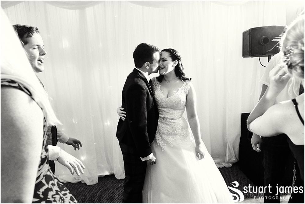 Capturing the fun of the evening reception as the dance floor fills for a fabulous night at The Moat House in Acton Trussell by Documentary Wedding Photographer Stuart James