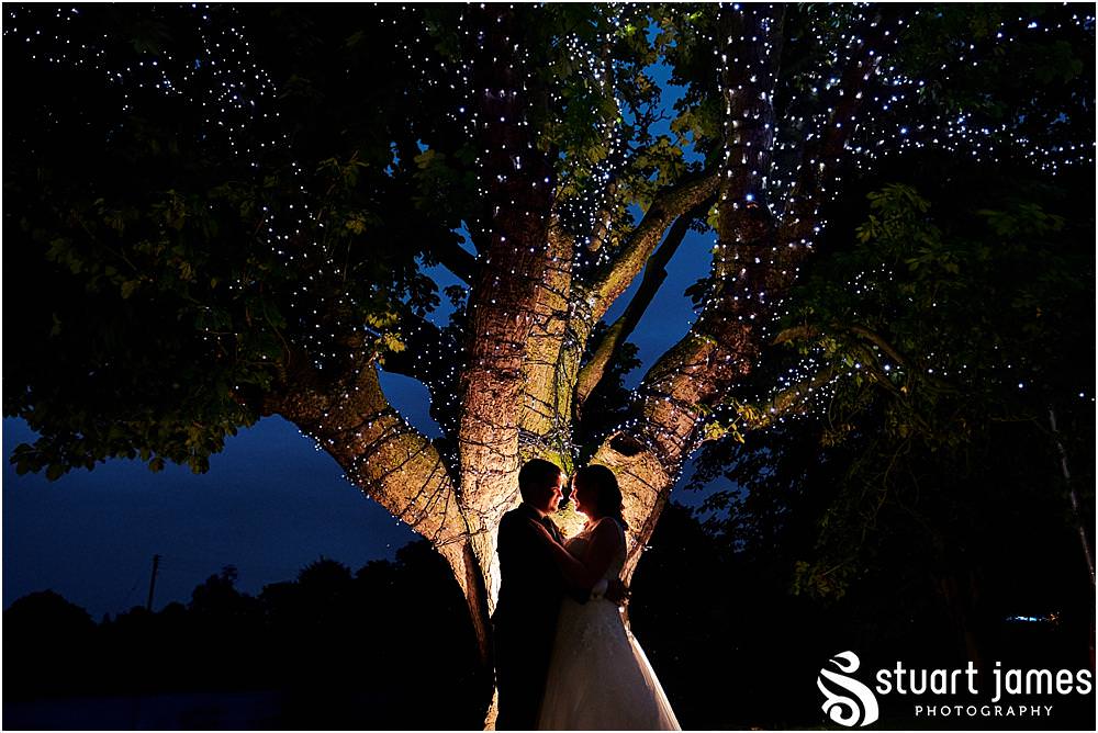 Finishing the story in style with the beautiful tree at The Moat House in Acton Trussell by Documentary Wedding Photographer Stuart James