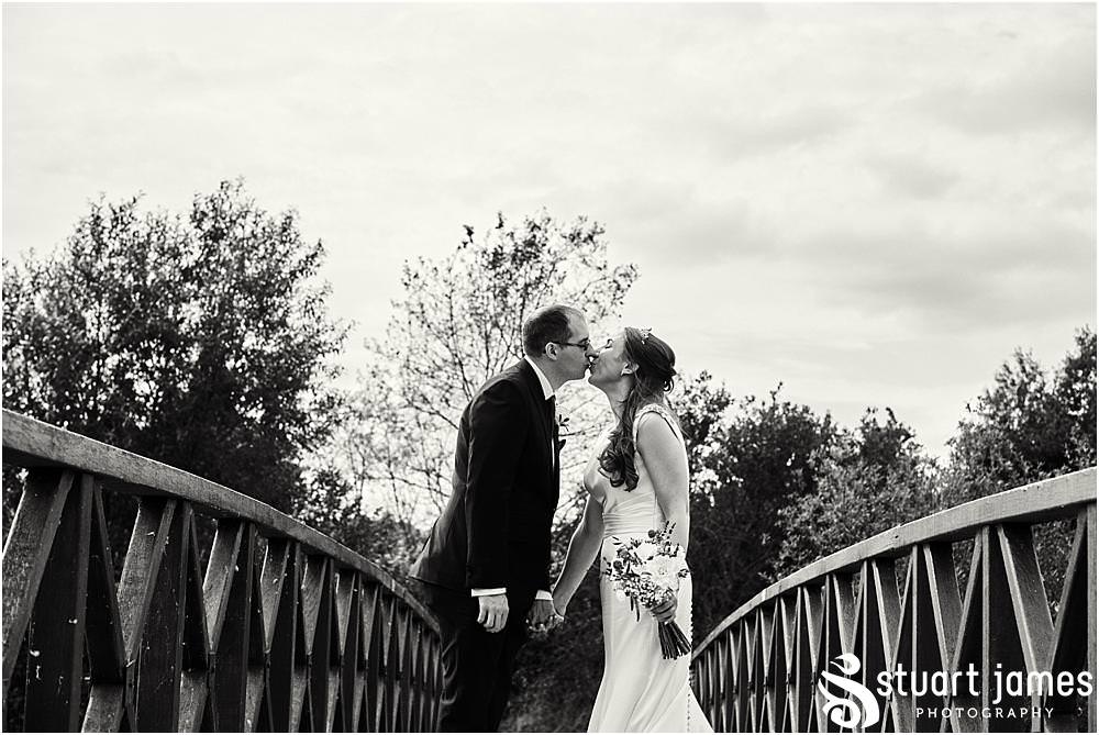 Creative portraits of the bride and groom around the fabulous waterfront setting at The Crows Nest at Barton Marina by Documentary Wedding Photographer Stuart James
