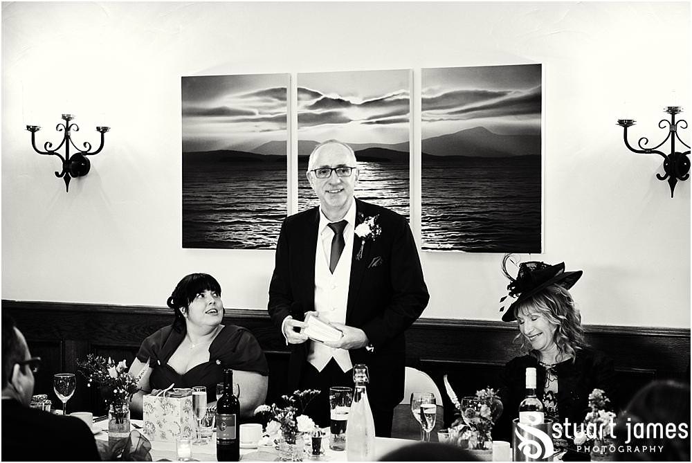 Wedding photos that show the mood and reaction to the beautiful speeches from the Father of the Bride at The Crows Nest at Barton Marina by Documentary Wedding Photographer Stuart James