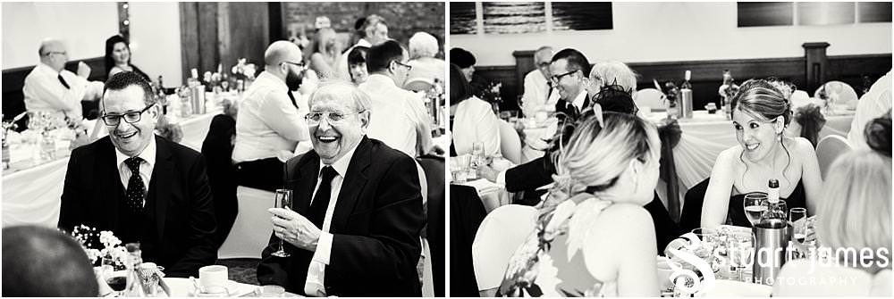 Creative candid photographs as the guests enjoy the wedding reception at The Crows Nest at Barton Marina by Documentary Wedding Photographer Stuart James