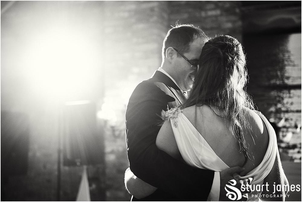 Creative lighting for the first dance at The Crows Nest at Barton Marina by Documentary Wedding Photographer Stuart James