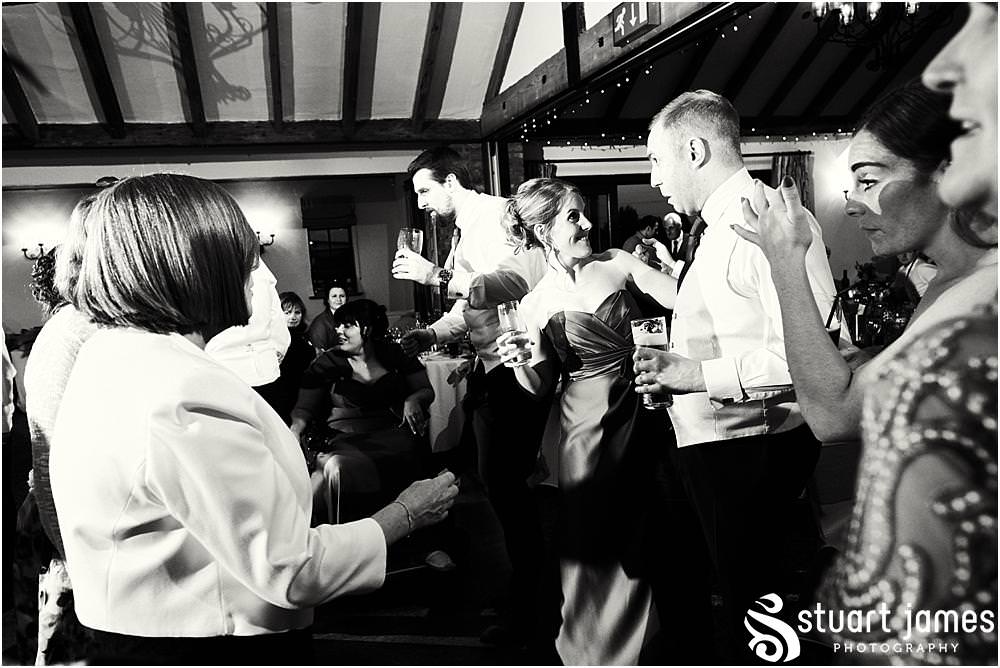 Creative fun photographs showing the fabulous evening reception at The Crows Nest at Barton Marina by Documentary Wedding Photographer Stuart James