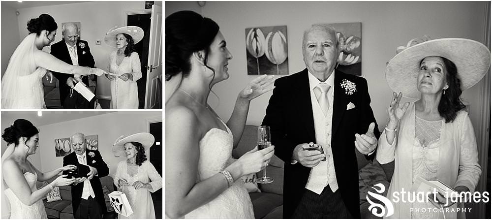 Incredible moments to capture as the Father of the bride sees his beautiful daughter ready for the wedding at Holy Trinity Church in Sutton Coldfield by Documentary Wedding Photographer Stuart James