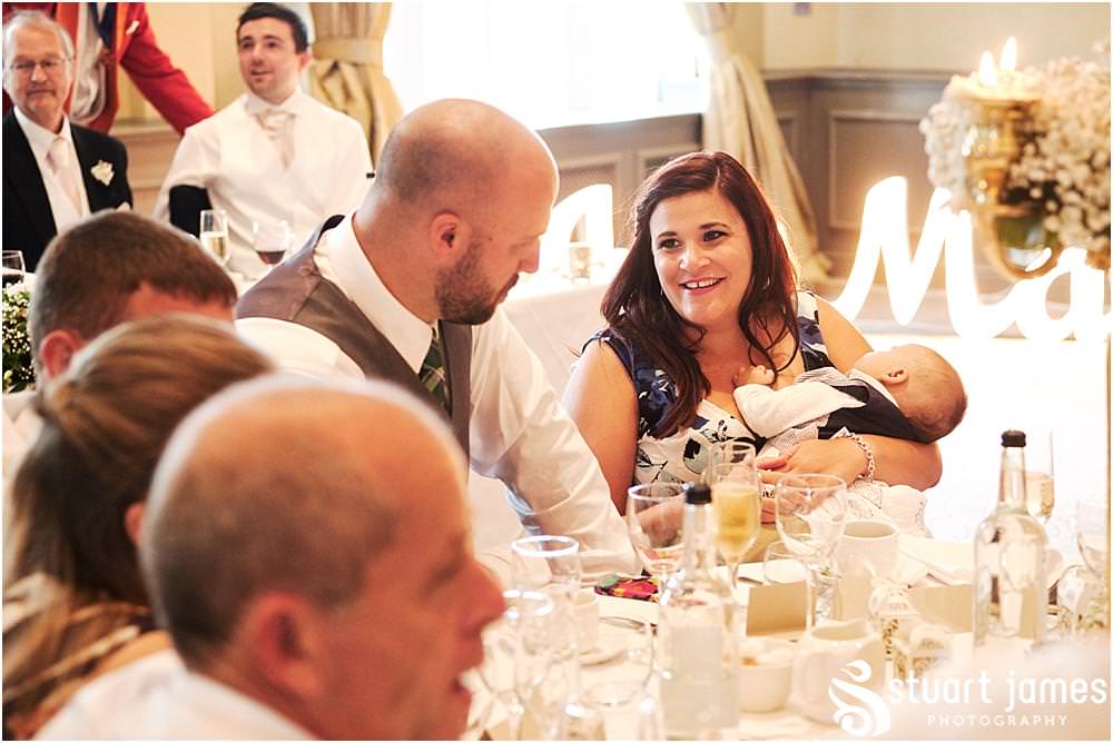Creative candid photographs of the guests relaxing and enjoying the wedding breakfast at The Belfry in Sutton Coldfield by Documentary Wedding Photographer Stuart James