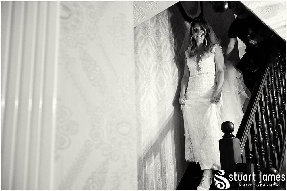 Capturing the beautiful moment that the Father of the Bride sees his daughter before the wedding at Bishton Hall in Stafford by Documentary Wedding Photographer Stuart James