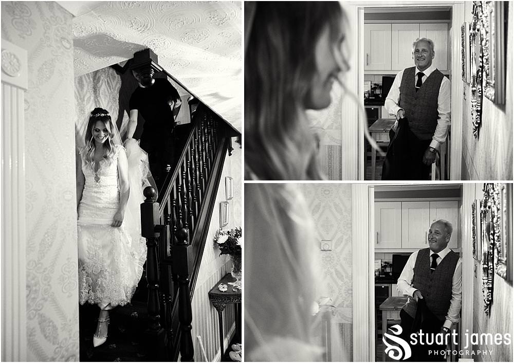 Capturing the beautiful moment that the Father of the Bride sees his daughter before the wedding at Bishton Hall in Stafford by Documentary Wedding Photographer Stuart James