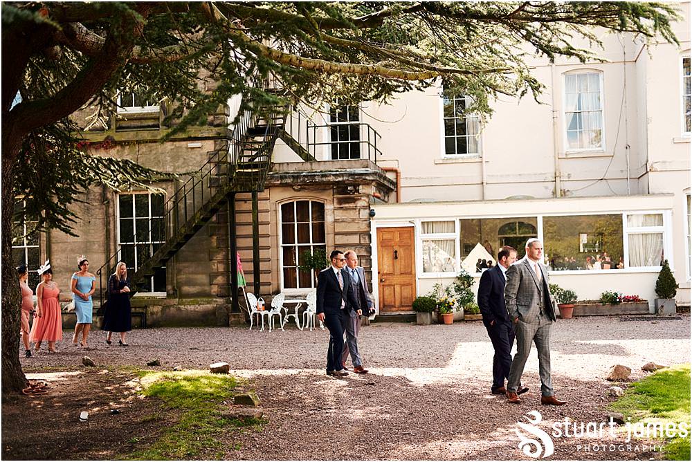 Capturing the arrival of the guests for the wedding at Bishton Hall in Stafford by Documentary Wedding Photographer Stuart James
