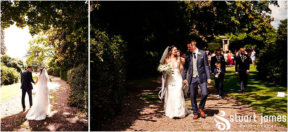 The new Mr & Mrs take their first journey as husband and wife at Bishton Hall in Stafford by Documentary Wedding Photographer Stuart James
