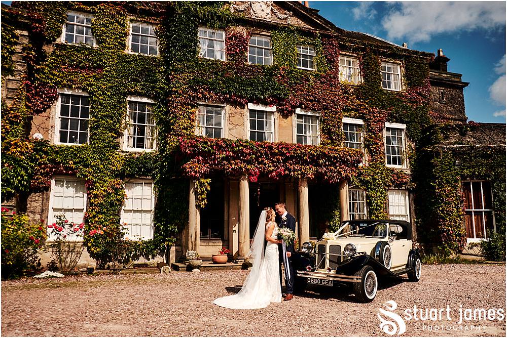 Perfect wedding cars from His and Hers Wedding Cars at Bishton Hall in Stafford by Documentary Wedding Photographer Stuart James