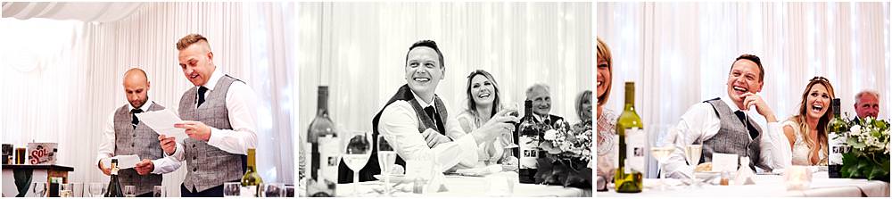 Capturing the reaction and the entertainment during the best mens speeches at Bishton Hall in Stafford by Documentary Wedding Photographer Stuart James