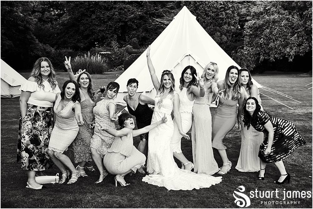 Relaxed creative candid photographs of the guests enjoying the fabulous wedding dat at Bishton Hall in Stafford by Documentary Wedding Photographer Stuart James