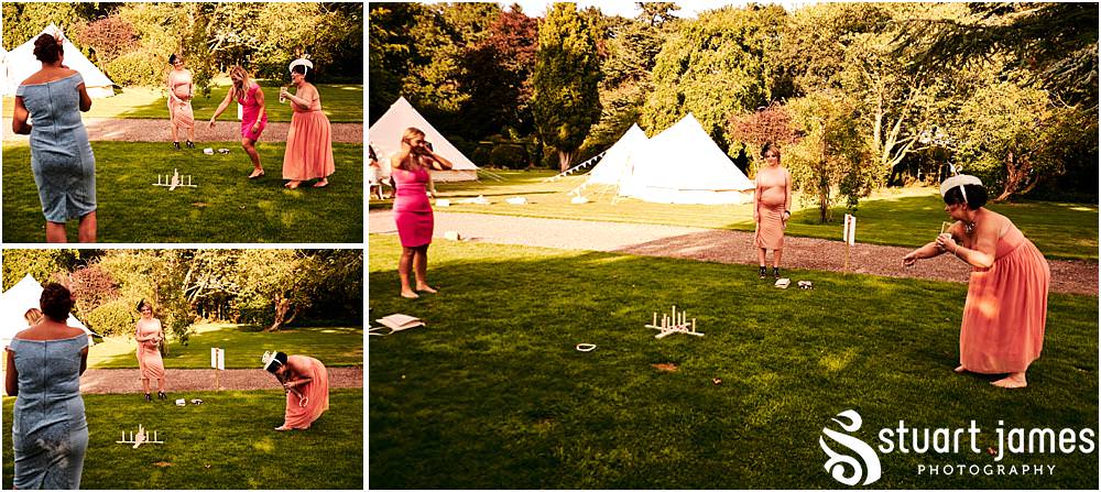 Capturing the guests enjoying the garden games during the wedding evening reception at Bishton Hall in Stafford by Documentary Wedding Photographer Stuart James