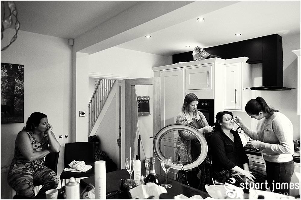 Bridal hair and makeup photographs ahead of the wedding at St Marks Church Great Wyrley in Walsall by Documentary Wedding Photographer Stuart James