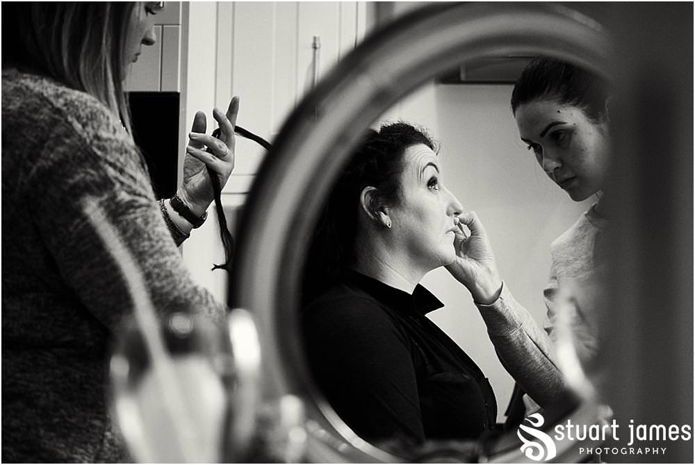 Bridal hair and makeup photographs ahead of the wedding at St Marks Church Great Wyrley in Walsall by Documentary Wedding Photographer Stuart James