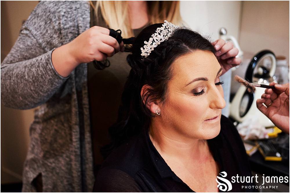 Creative photographs of the wedding preparations of the bridal party ahead of the wedding at St Marks Church Great Wyrley in Walsall by Documentary Wedding Photographer Stuart James