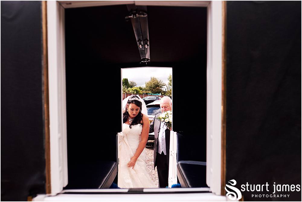 Beautiful photographs of the brides journey to church with Horse and Carriage at St Marks Church Great Wyrley in Walsall by Documentary Wedding Photographer Stuart James