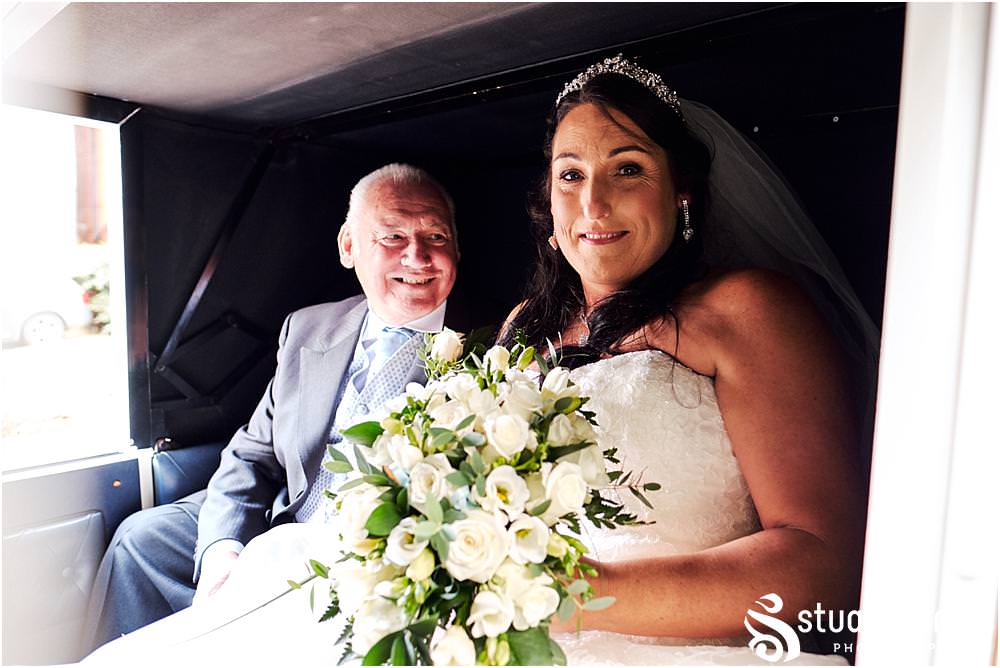 Beautiful photographs of the brides journey to church with Horse and Carriage at St Marks Church Great Wyrley in Walsall by Documentary Wedding Photographer Stuart James