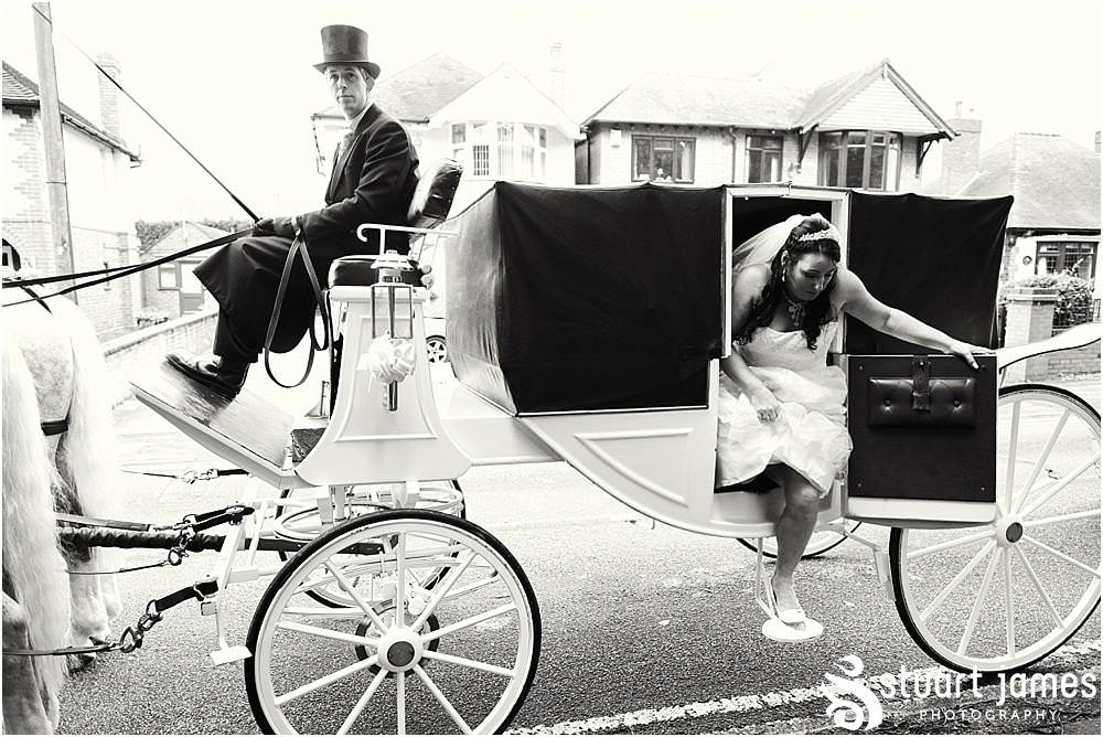 Beautiful photographs of the brides journey to church with Horse and Carriage at St Marks Church Great Wyrley in Walsall by Documentary Wedding Photographer Stuart James