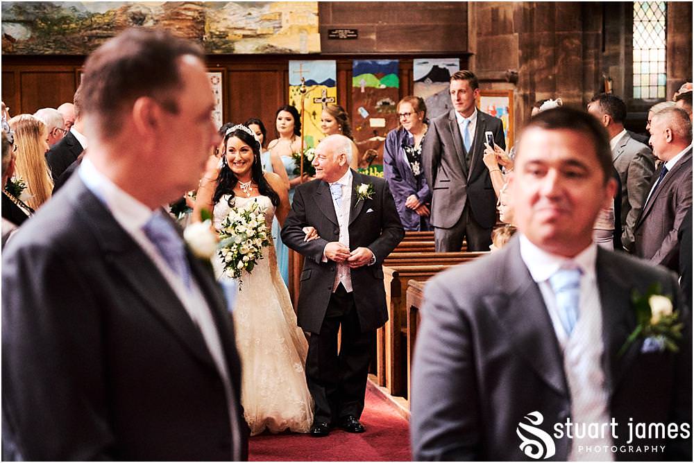 Capturing the entrance of the bride to the ceremony at St Marks Church Great Wyrley in Walsall by Documentary Wedding Photographer Stuart James
