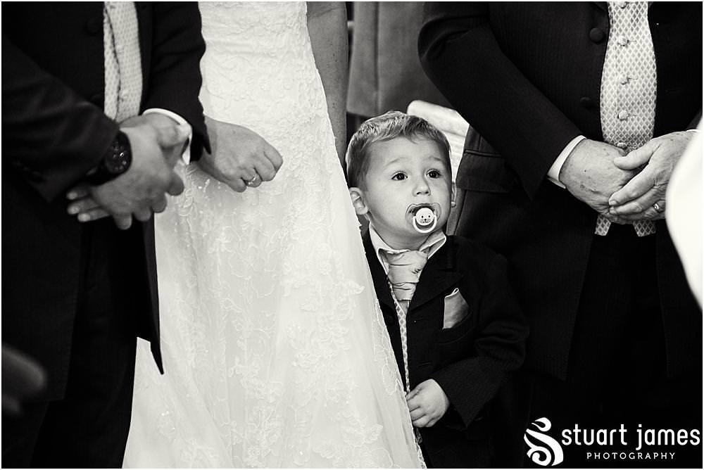 Capturing the entrance of the bride to the ceremony at St Marks Church Great Wyrley in Walsall by Documentary Wedding Photographer Stuart James