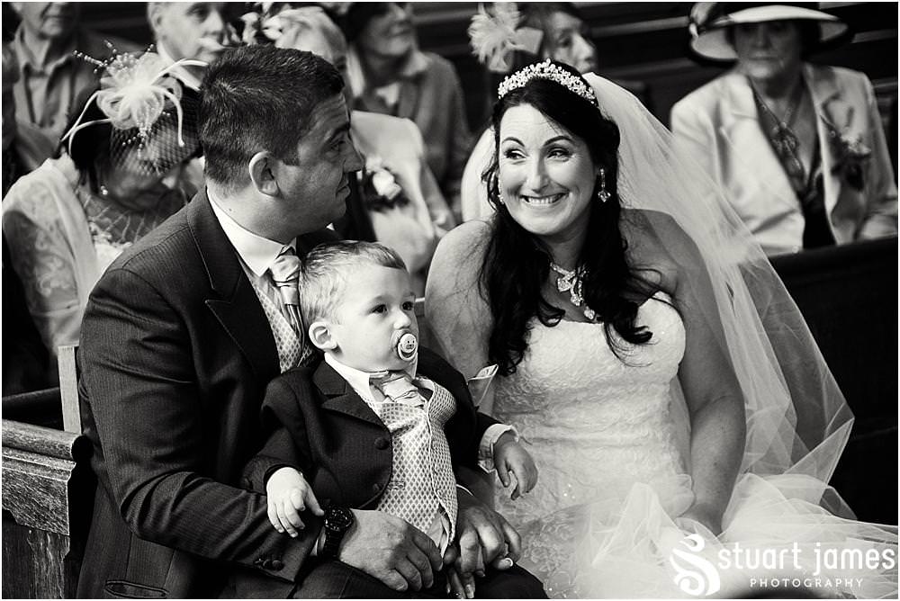 Unobtrusive storytelling photographs of the wedding ceremony at St Marks Church Great Wyrley in Walsall by Documentary Wedding Photographer Stuart James