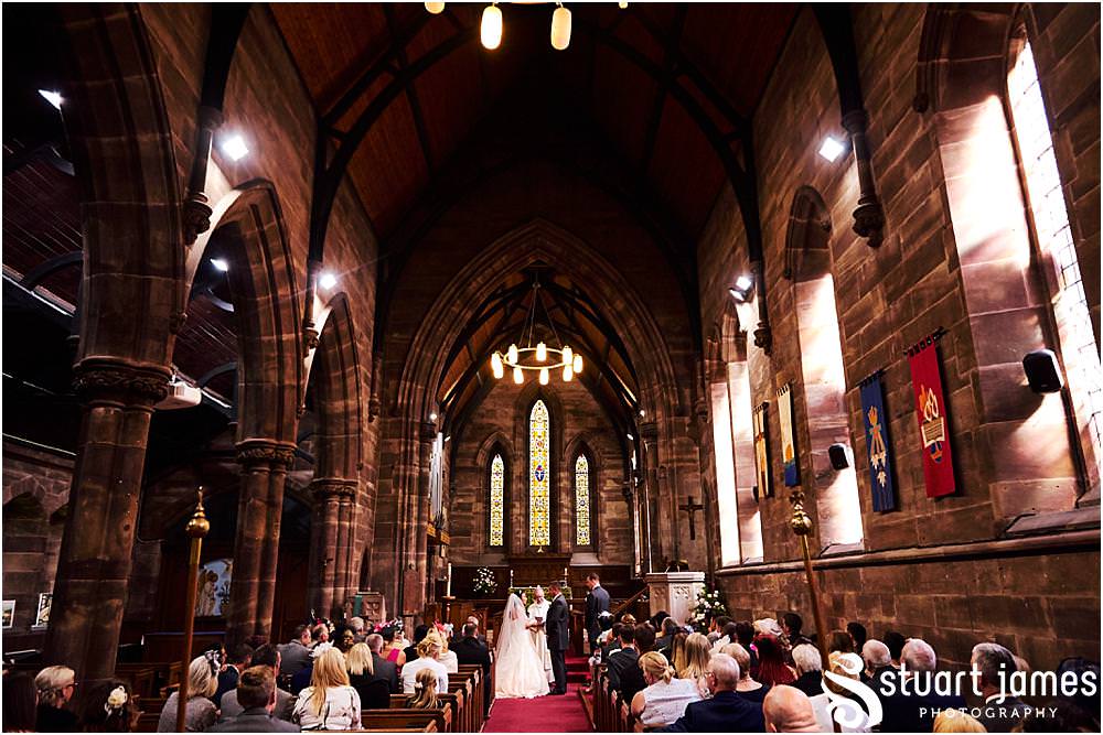 Unobtrusive storytelling photographs of the wedding ceremony at St Marks Church Great Wyrley in Walsall by Documentary Wedding Photographer Stuart James