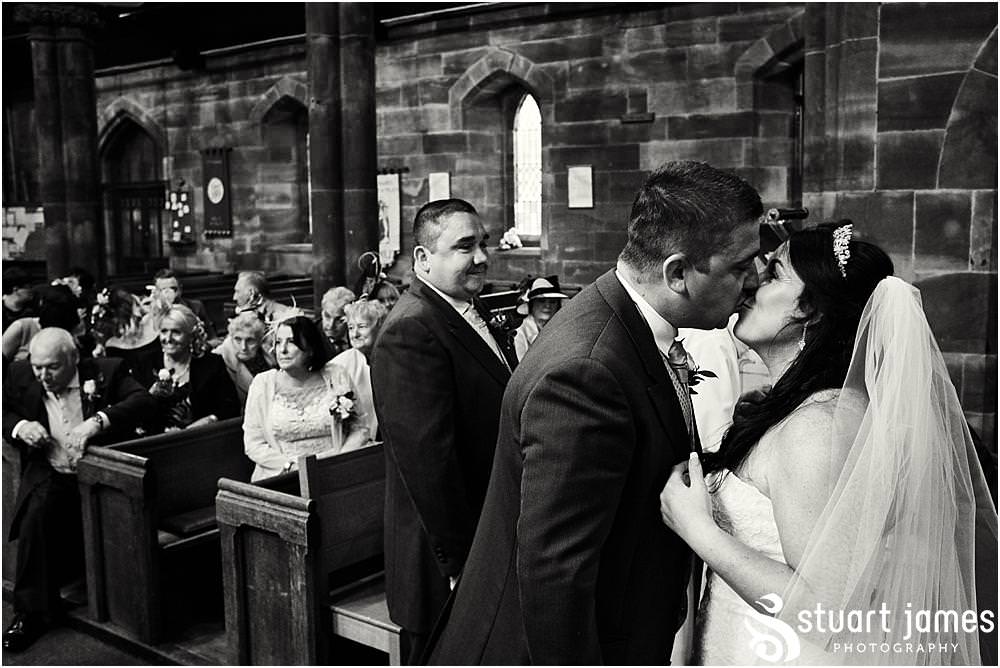 Unobtrusive storytelling photographs of the wedding ceremony at St Marks Church Great Wyrley in Walsall by Documentary Wedding Photographer Stuart James